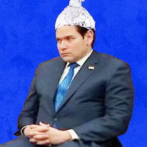 A photo illustration of Marco Rubio wearing an tinfoil hat.