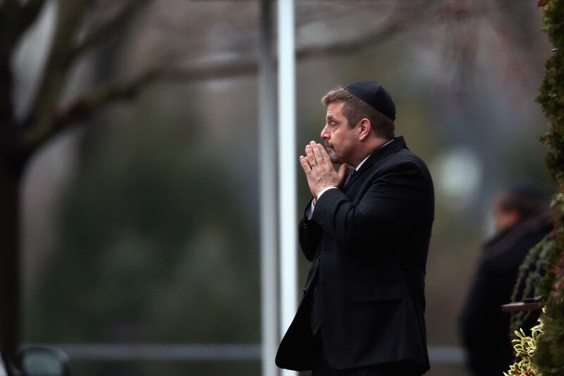 galleries/2012/12/17/newtown-funerals-the-faces-of-grief-photos/17shooting-funeral4_l3hqiz