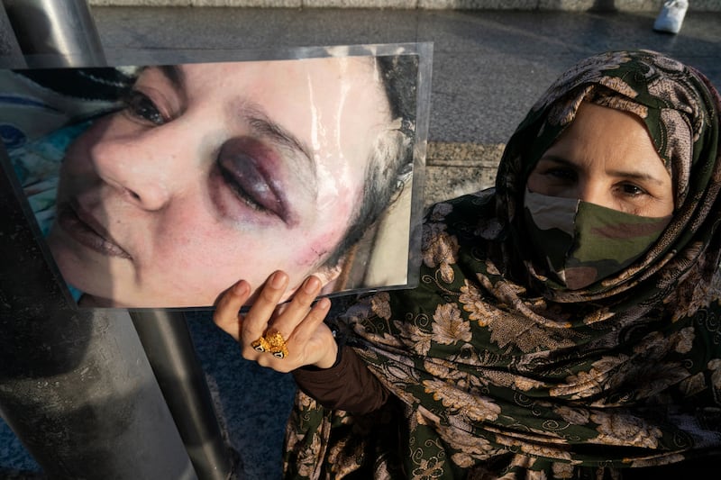 A Saharawi woman shows a photo of the activist Sultana Khaya, thanked by the Moroccan police, in the Solidarity Day with the Saharawi people in the Plaza de la Llama in Torrelavega (Cantabria). In which the 45th anniversary of the proclamation of the SADR (Sahrawi Arab Democratic Republic) was commemorated.
(Photo by Joaquin Gomez Sastre/NurPhoto via Getty Images)