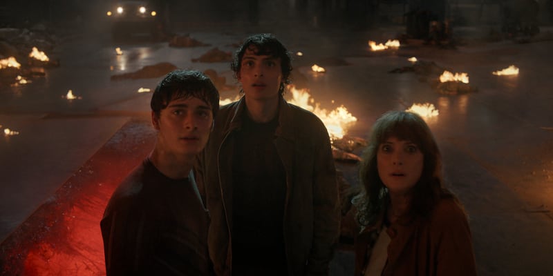 Noah Schnapp as Will Byers, Finn Wolfhard as Mike Wheeler, and Winona Ryder as Joyce Byers