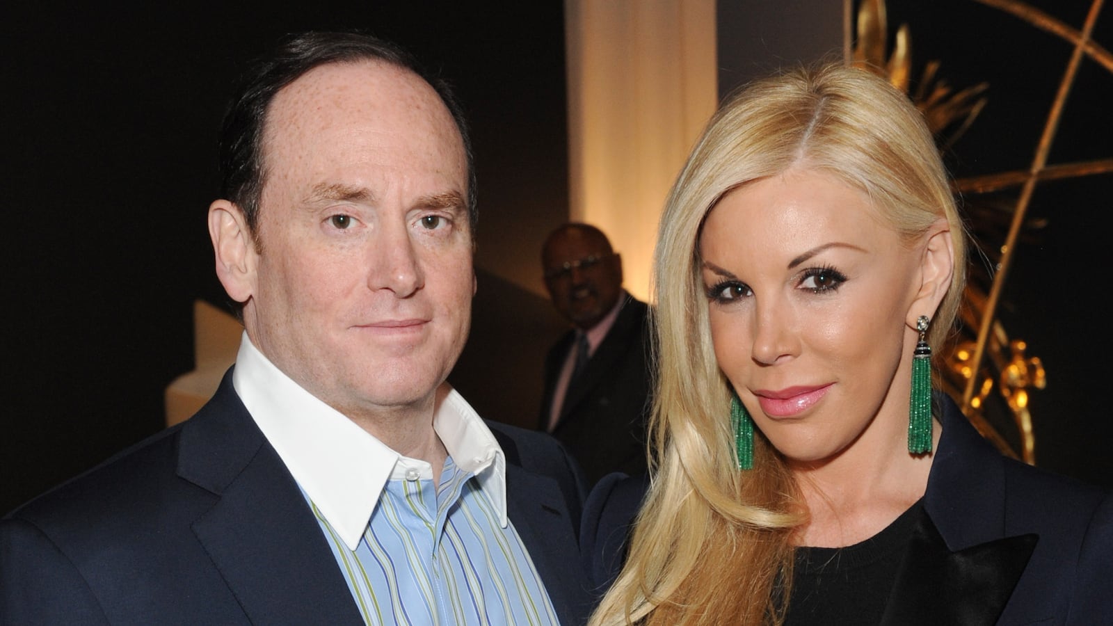 John Phelan and Amy Phelan attend an exhibition of new paintings by renowned American artist Marc Dennis, at the Christopher Guy London Showroom on March 10, 2015 in London, England.