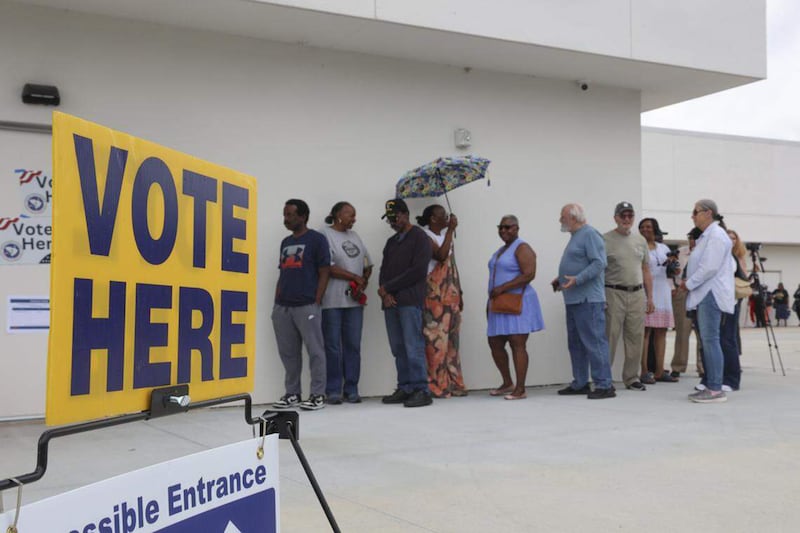 People wait in line to vote on the first day of early voting on Tuesday, May 26, 2026, at the Richland County Voter Registration office in South Carolina as state lawmakers killed an effort to redistrict for now.
