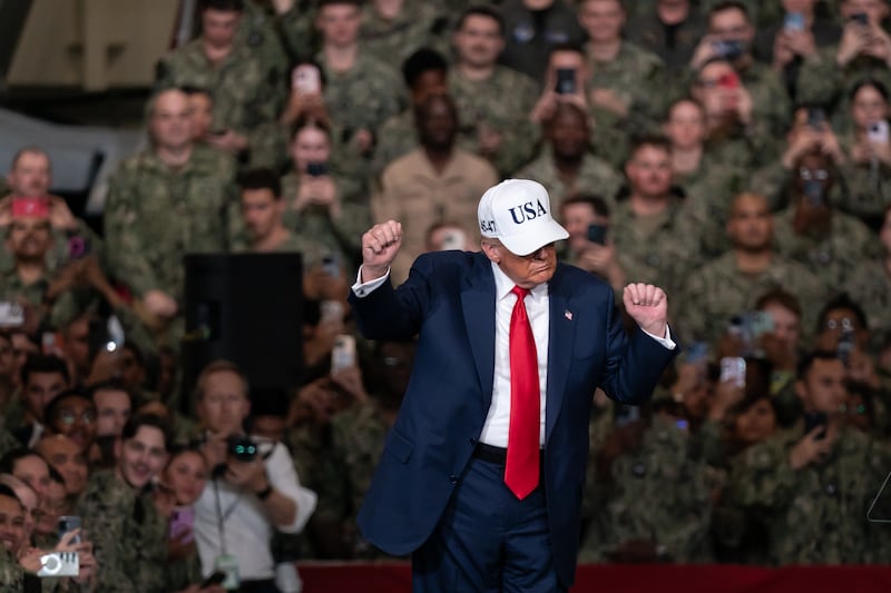 YOKOSUKA, JAPAN - OCTOBER 28: U.S. President Donald Trump dances after speaking to troops aboard USS George Washington on October 28, 2025 in Yokosuka, Japan. Trump is visiting Japan, fresh off an appearance at the ASEAN summit in Malaysia, and will next travel to South Korea for the APEC meetings. (Photo by Tomohiro Ohsumi/Getty Images)