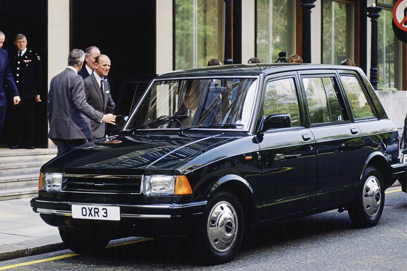 articles/2012/03/08/queen-and-prince-philip-show-their-thrifty-side-in-london-taxi/philips-cab-royalist_fcncqn