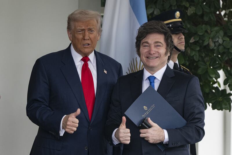 Donald Trump greets the President of Argentina Javier Milei at the White House in Washington DC , October 14, 2025.