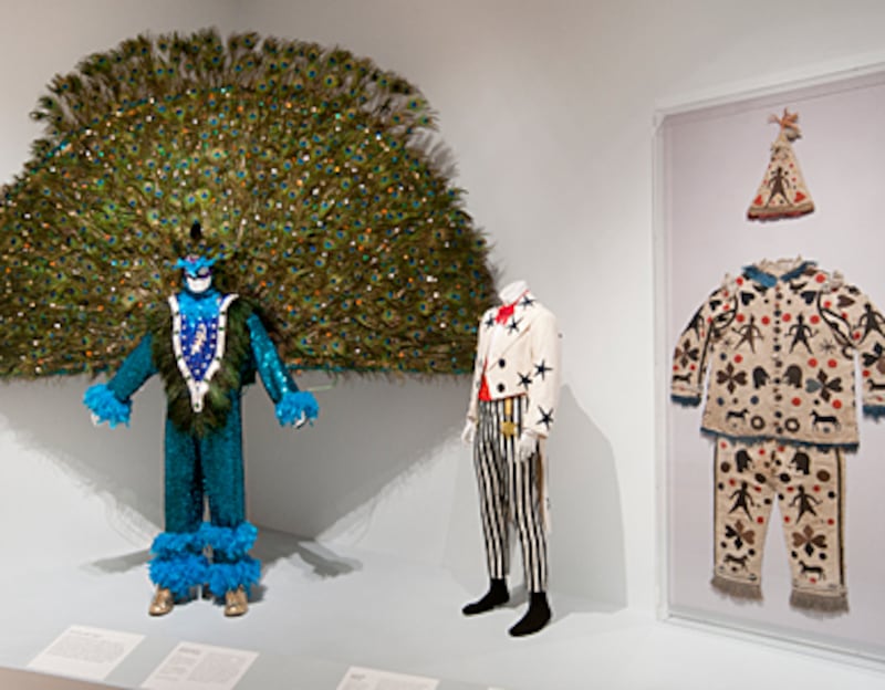 articles/2011/02/05/mens-clothing-the-peacock-male-exhibit-in-philadelphia/gopnik-peacock-male-gal-launch_sa1kmk