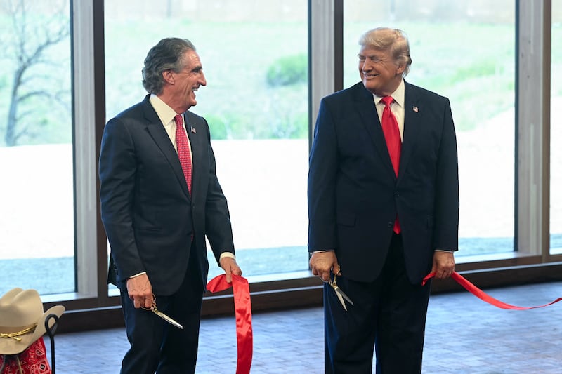 US Secretary of the Interior Doug Burgum and US President Donald Trump.