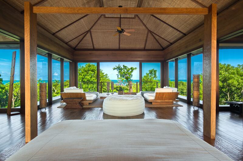 galleries/2014/11/29/omg-i-want-this-house-parrot-cay-turks-and-caicos-photos/141125-parrot-10_tlutz6