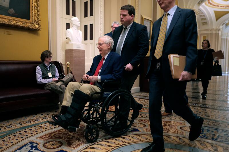 Sen. Mitch McConnell was pushed in a wheelchair at the U.S. Capitol in February after taking a spill, but he has since returned to walking to and from Senate votes.
