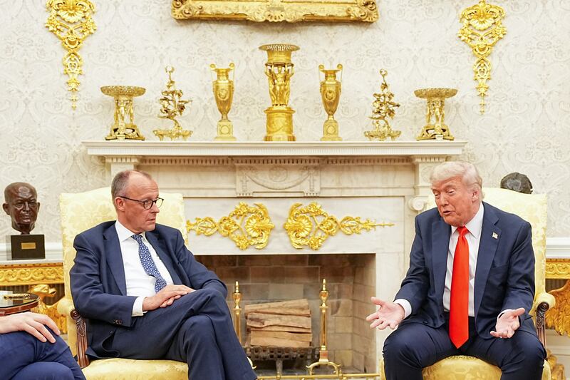 US President Donald Trump (r) receives German Chancellor Friedrich Merz (CDU) in the Oval Office at the White House
