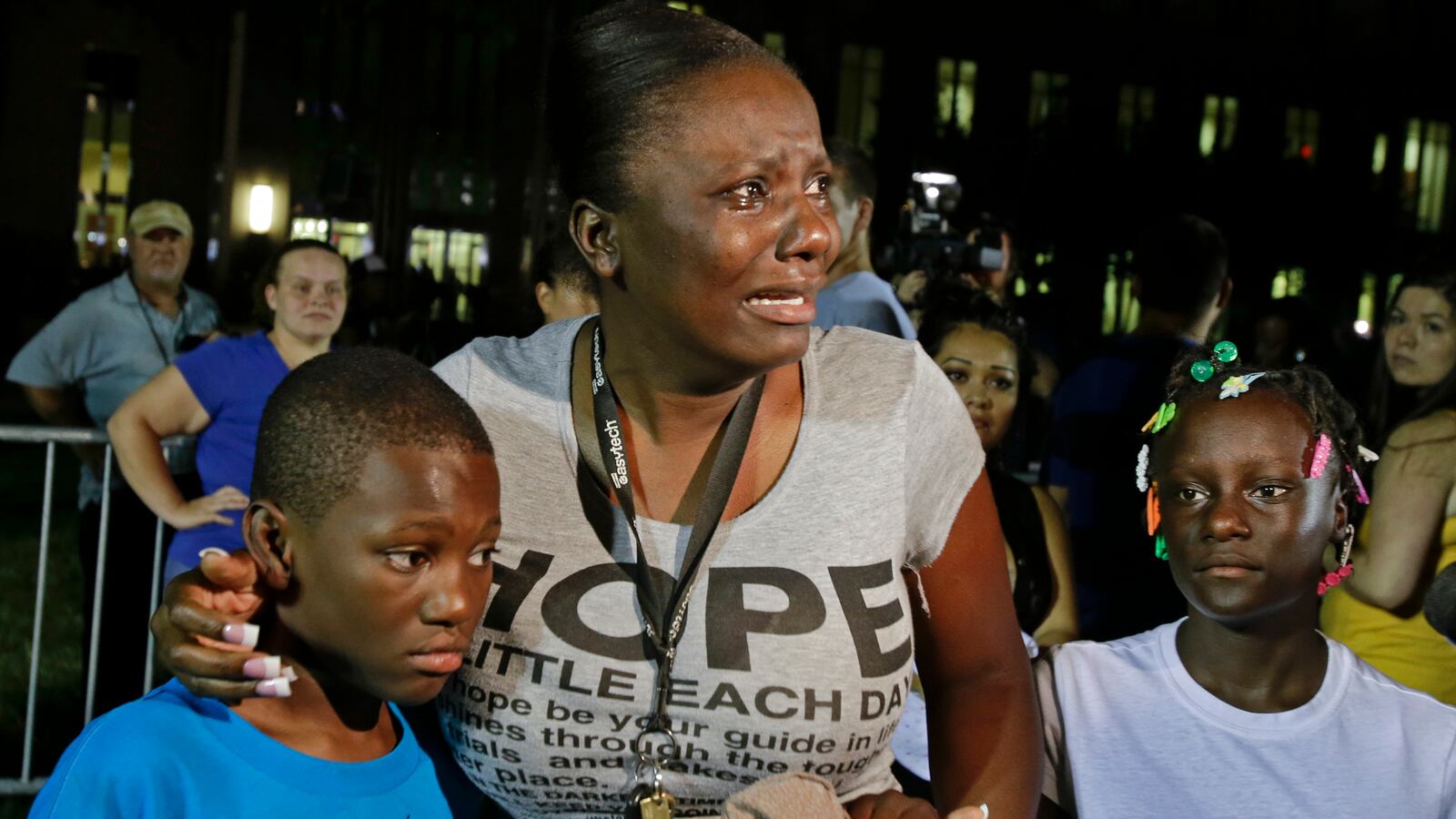 galleries/2013/07/14/george-zimmerman-not-guilty-america-reacts-photos/130714-zimmerman-reax-tease_fv8p0q