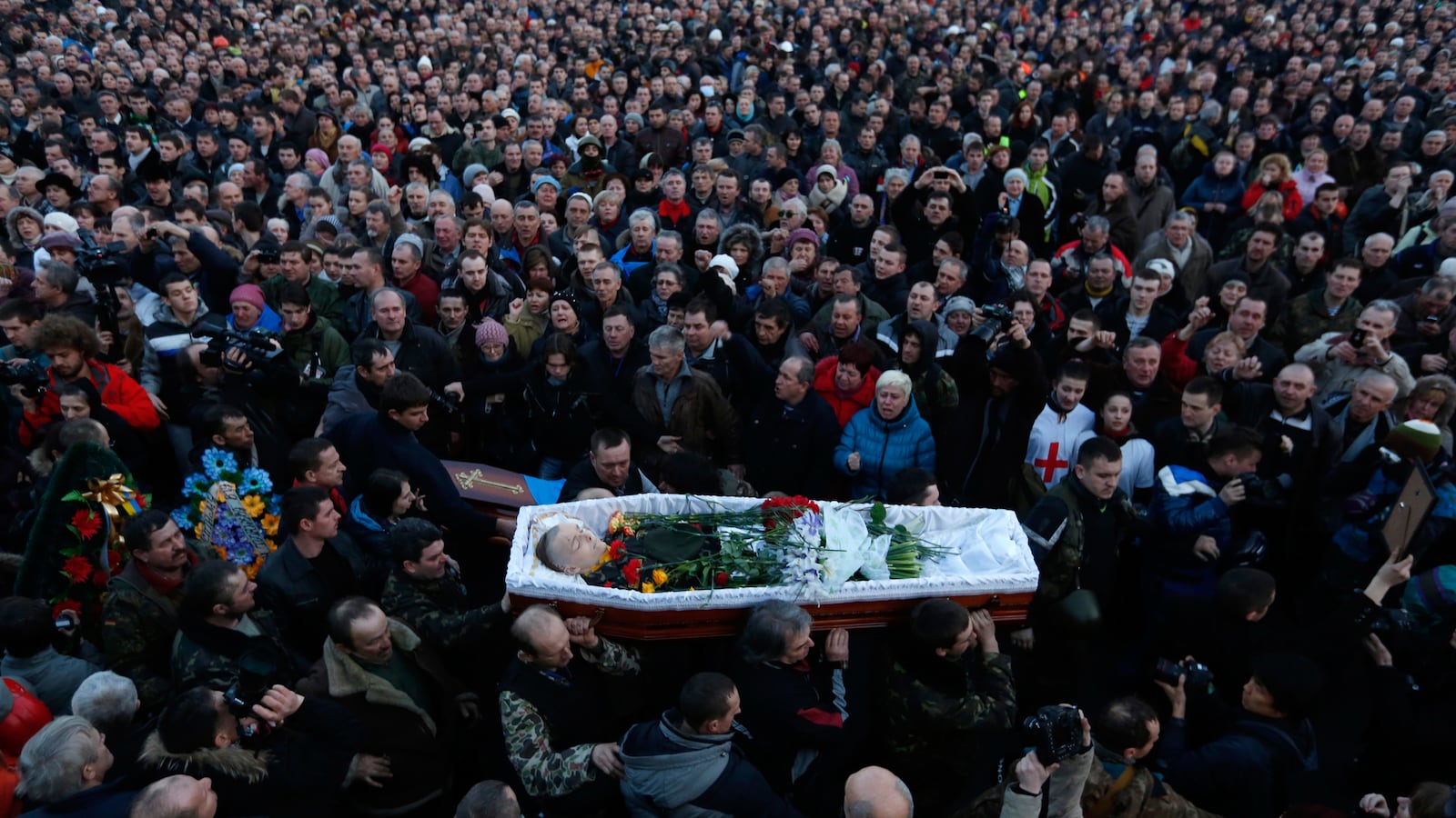 articles/2014/02/22/sochi-reacts-to-ukraine-s-bloodshed/140221-nemtsova-ukraine-tease_beshuz