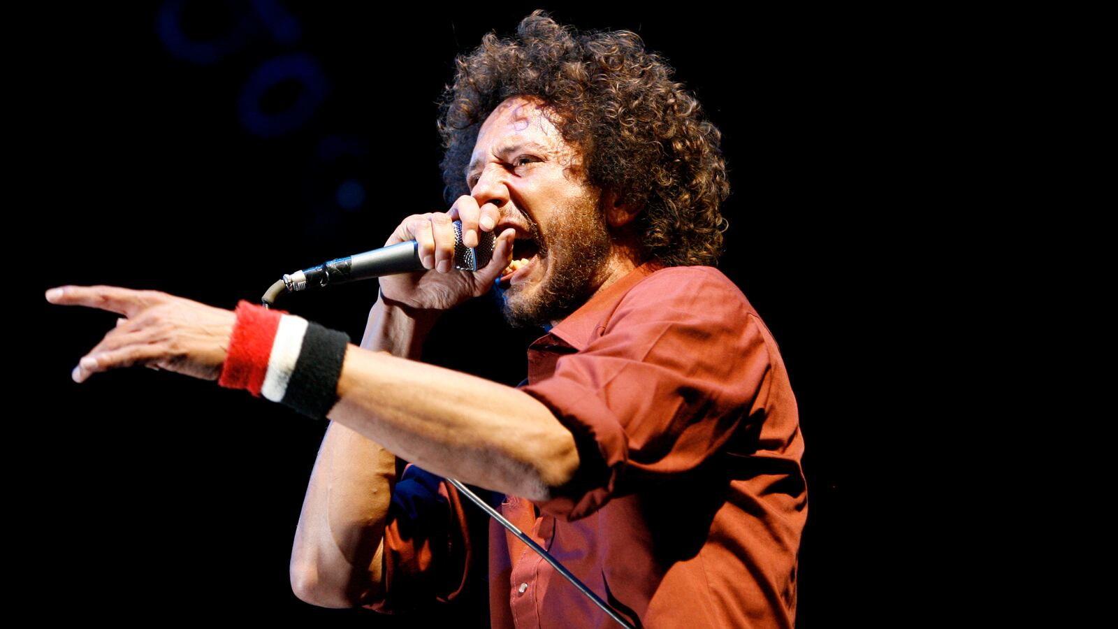 Lead singer Zack de la Rocha performs with Rage Against the Machine at their reunion concert during the Coachella Music Festival in Indio, California, April 29, 2007. The band split up in 2000.