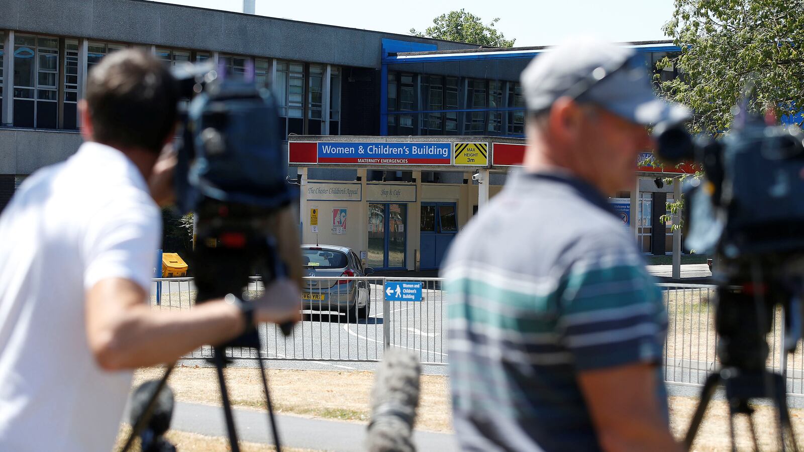 Televisions crews film outside the entrance to the Countess of Chester Hospital, Chester, Britain, July 3, 2018.