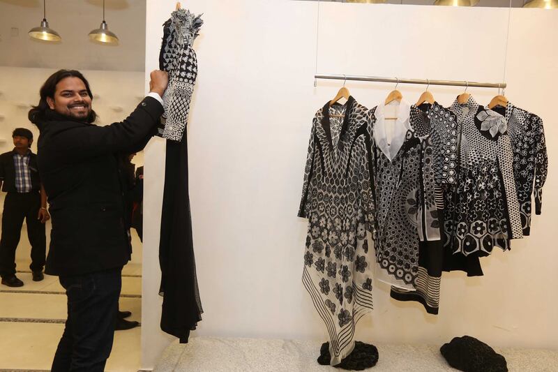 articles/2014/02/19/high-fashion-made-in-india/140217-foreman-made-india-tease_dmxoye