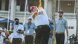 Donald Trump tees off during a visit a day ahead of the 2022 LIV Golf Invitational Miami at Trump National Doral Miami golf club on October 27, 2022 in Miami, Florida.