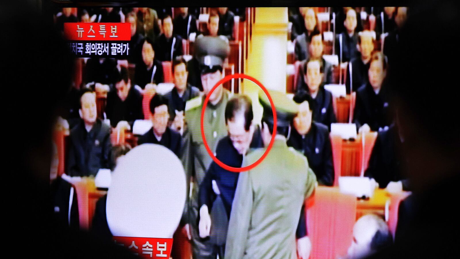 articles/2013/12/09/rare-images-show-kim-jong-un-s-uncle-being-dragged-away/131209-uncle-kimjong-cheat_jpbgtg
