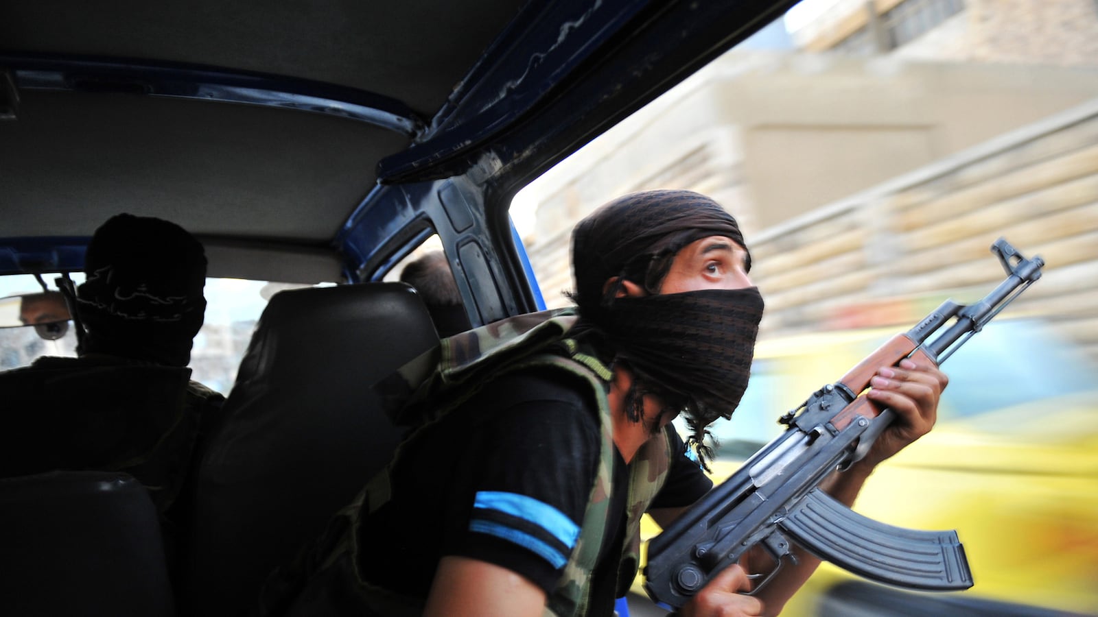 articles/2012/07/26/syrian-rebel-leader-mustafa-al-sheikh-says-victory-against-assad-not-in-sight/giglio-fsa-rebels-syria-embed_y573et