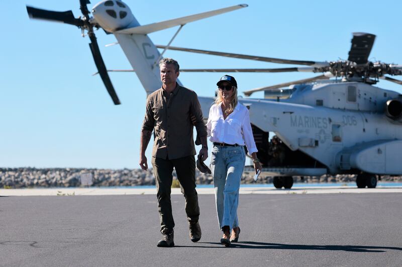 U.S. Secretary of War Pete Hegseth and his wife Jennifer Rauchet arrive for the America's Marines 250 event