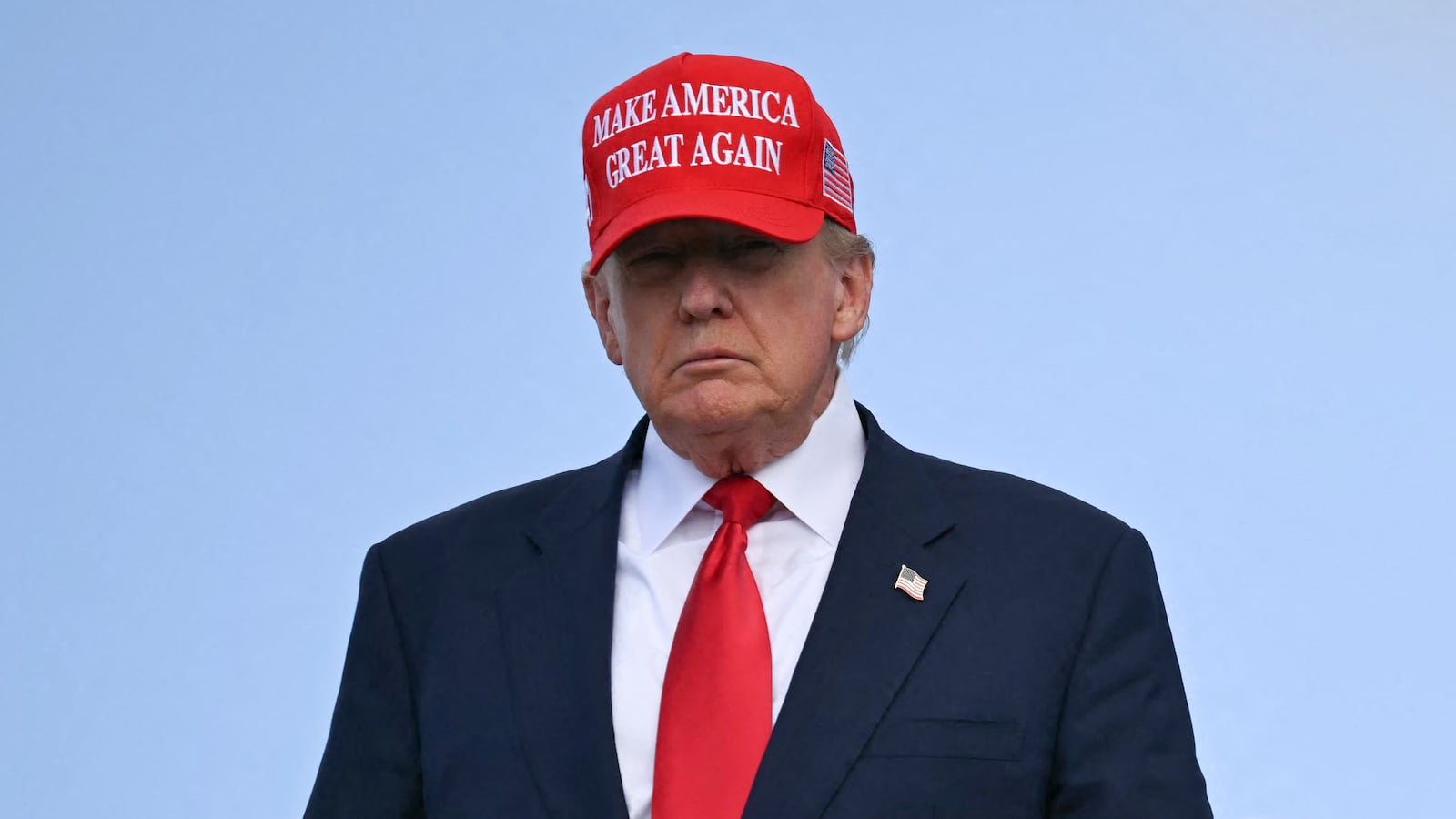 US President Donald Trump steps off Air Force One upon arrival at Joint Base Andrews in Maryland on October 30, 2025. The United States is cutting back the number of refugees to be accepted annually to a record low 7,500 and giving priority to white South Africans. The move, published in the official Federal Register on Thursday, comes after President Donald Trump essentially halted refugee arrivals after taking office in January. (Photo by ANDREW CABALLERO-REYNOLDS / AFP)
