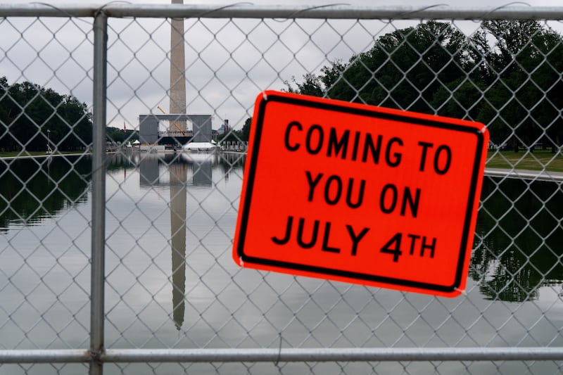 A sign is displayed on the fence surrounding the Reflecting Pool as preparations to celebrate the 250th anniversary of U.S. Independence continue near the Lincoln Memorial on the National Mall in Washington, D.C., U.S., June 28, 2026. REUTERS/Elizabeth Frantz