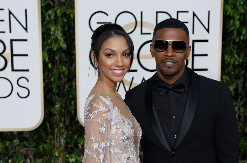 Actor Jamie Foxx and daughter, Corrine Foxx at the Golden Globe Awards 2016.  REUTERS/Mario Anzuoni