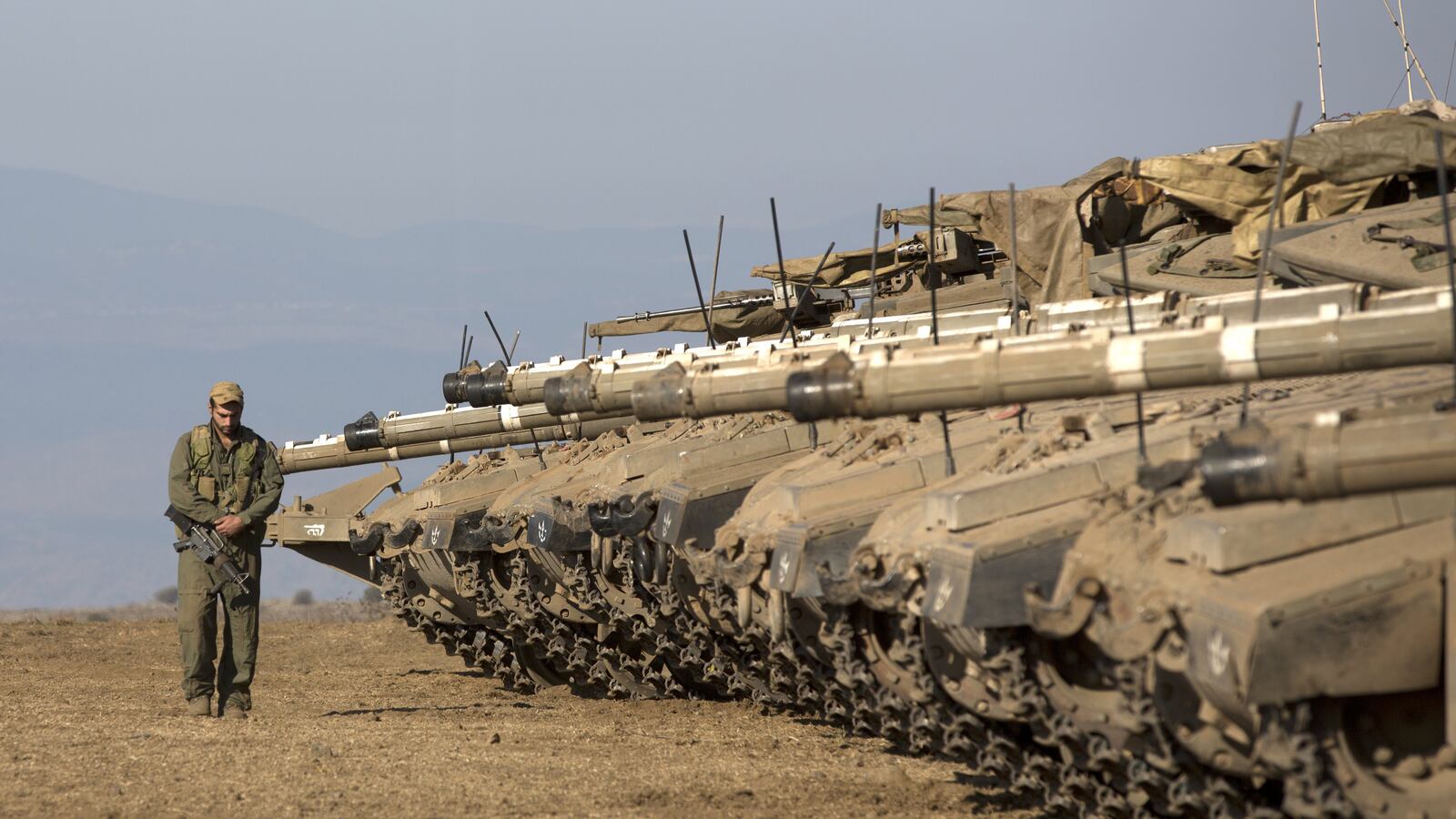 articles/2013/08/28/why-israel-is-concerned-about-chemical-weapons-but-will-stay-out-of-syria/golan-tanks-openz_sgb4fm