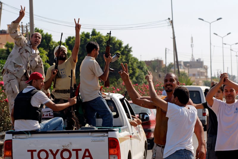 galleries/2011/08/21/libya-rebels-take-tripoli-capture-gaddafi-sons-photos/libya-celebration-gallery3_sjc3nn
