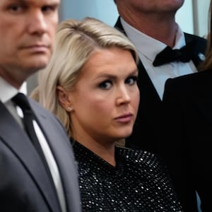 Secretary of State Marco Rubio, U.S. Secretary of War Pete Hegseth, White House Press Secretary Karoline Leavitt, and First Lady Melania Trump listen as U.S. President Donald Trump speaks during a press conference in the Brady Briefing Room of the White House on April 25, 2026 in Washington, DC. President Trump is making a statement after the cancelation of the annual White House Correspondents Association Dinner after a possible shooting.