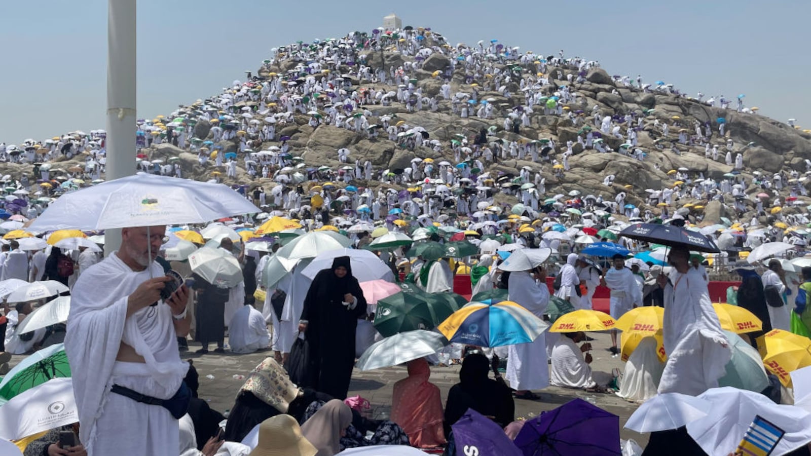 Prospective pilgrims pray at the Jabal ar-Rahmah in Arafat as Muslims continue their worship to fulfill the Hajj pilgrimage in Mecca, Saudi Arabia, on June 15, 2024.