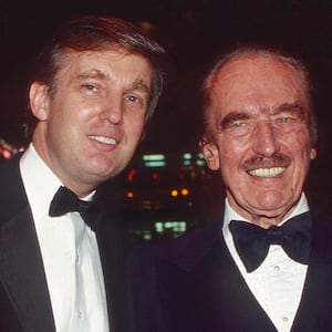 Donald Trump and Fred Trump as they attend a book release party to celebrate 'Trump: The Art of the Deal' in the Trump Tower Atrium, New York, New York, December 12, 1987.