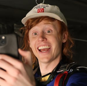 SATURDAY NIGHT LIVE -- Episode 1868 -- Pictured: (l-r) John Higgins, Ben Marshall, and Martin Herlihy during the "Skydiving" sketch on Saturday, October 19, 2024 -- (Photo by: Holland Rainwater/NBC via Getty Images)
