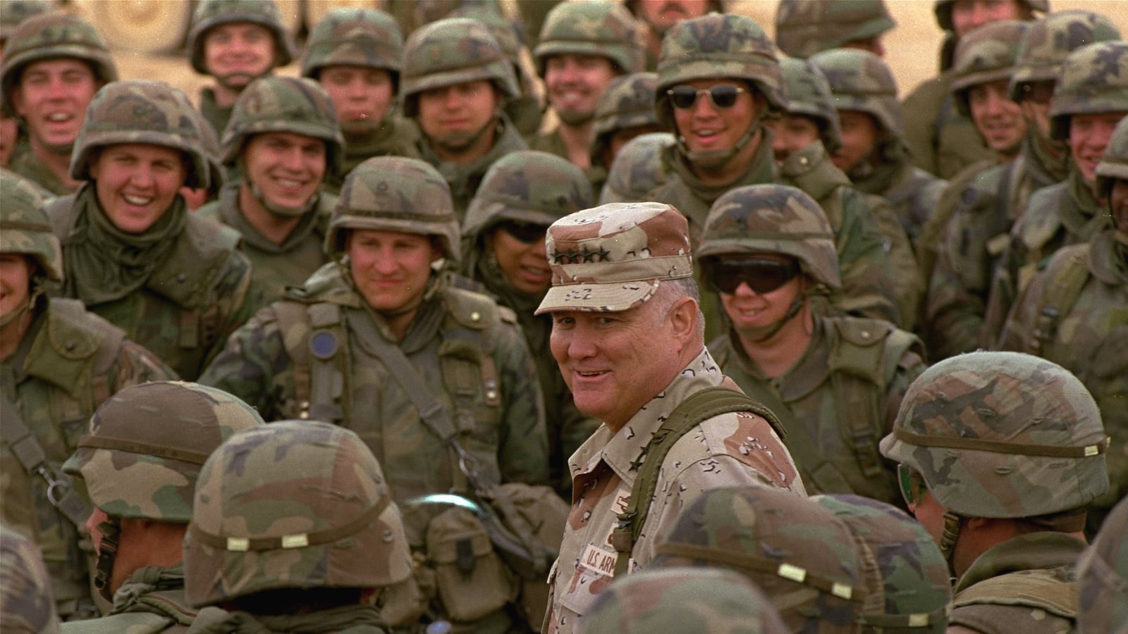 articles/2012/12/29/norman-schwarzkopf-s-lionization-ignores-a-dark-gulf-war-legacy-untreated-vets/Schwarzkopf-troops-tease_xmog0e