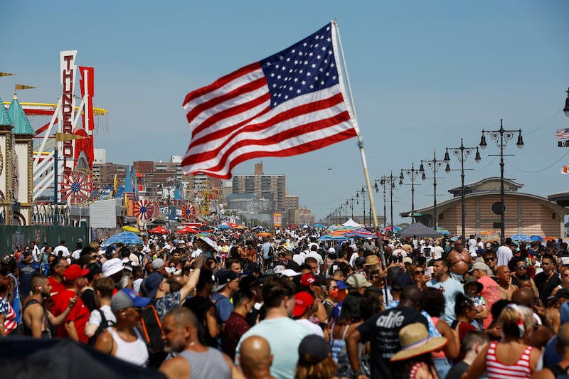 People celebrate the 4th of July on an overcrowded beach at Coney Island in New York, U.S., July 4, 2022.
