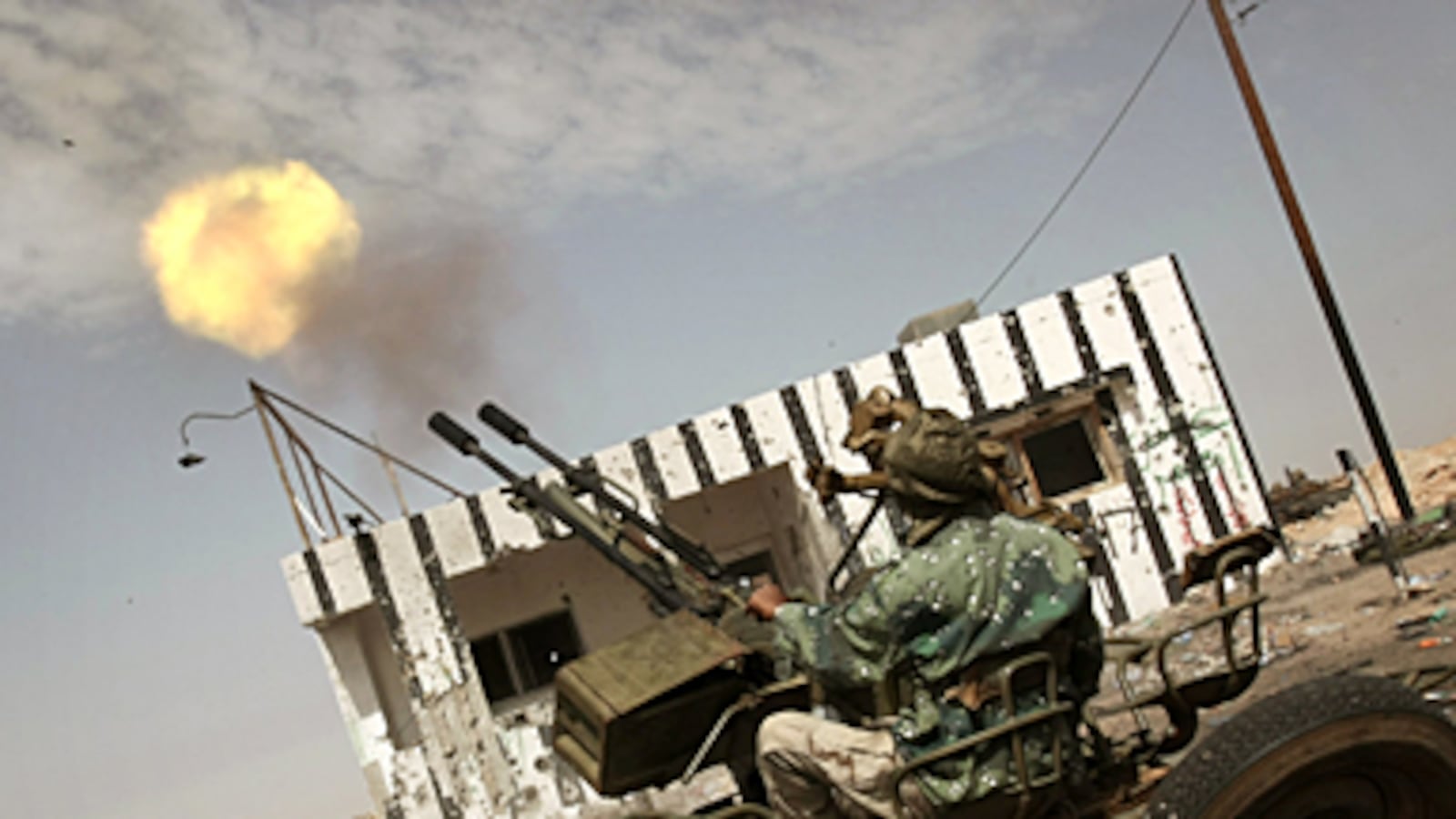 cheats/2011/04/02/ex-mujahedeen-lead-libyan-rebels/babak-bloody-libya_169921_ie8xak