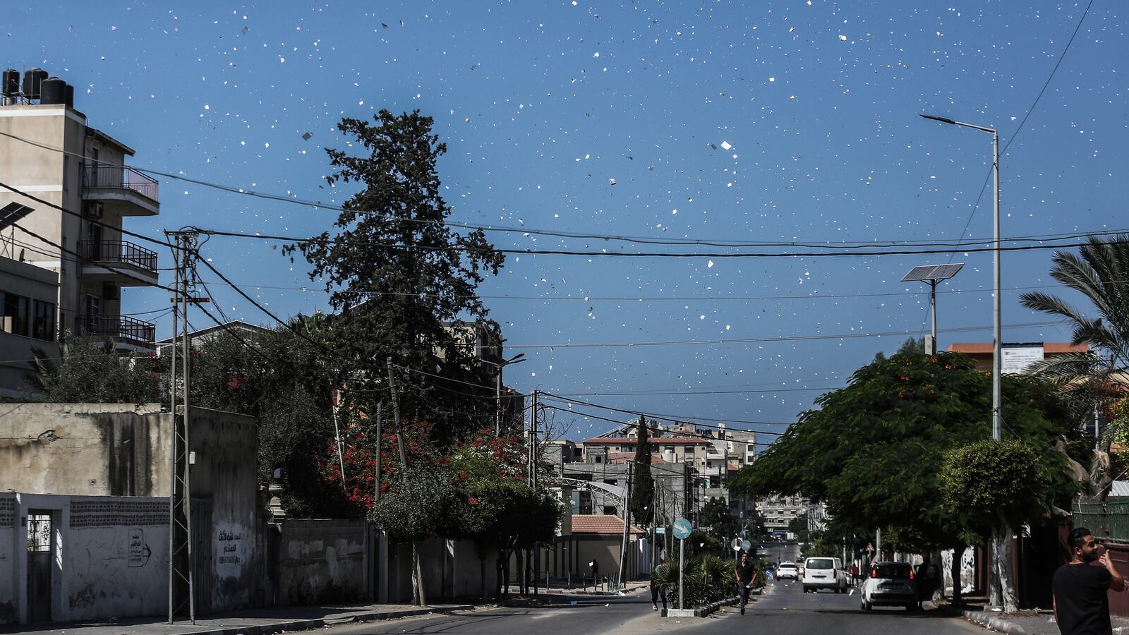 Palestinian Territories, Gaza City: Israeli army planes drop leaflets over Gaza City residents