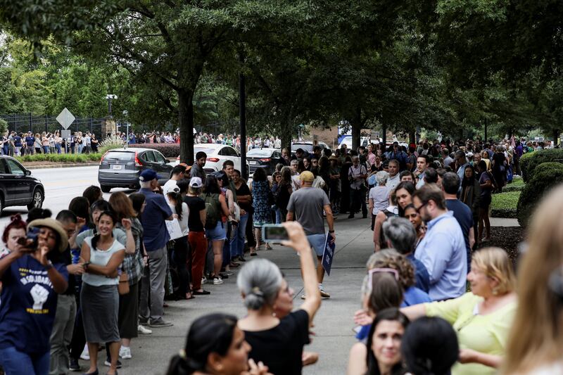 Centers for Disease Control and Prevention (CDC) employees in Atlanta join a clap-out celebration honoring former colleagues who resigned, a day after the White House fired CDC director Susan Monarez and several top officials resigned.