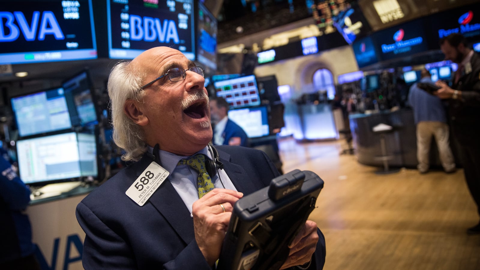NEW YORK, NY - FEBRUARY 13: A trader works on the floor of the New York Stock Exchange during the afternoon of February 13, 2015 in New York City. The Dow Jones Industrial Average closed above 18,000 points for the first time in market history. (Photo by Andrew Burton/Getty Images)