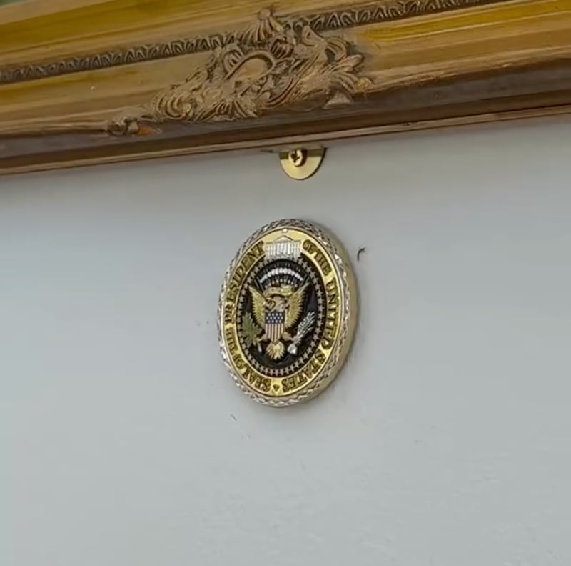 One of several golden, presidential medallions that Lara Trump claims her father-in-law has installed throughout the White House, including in its showers.