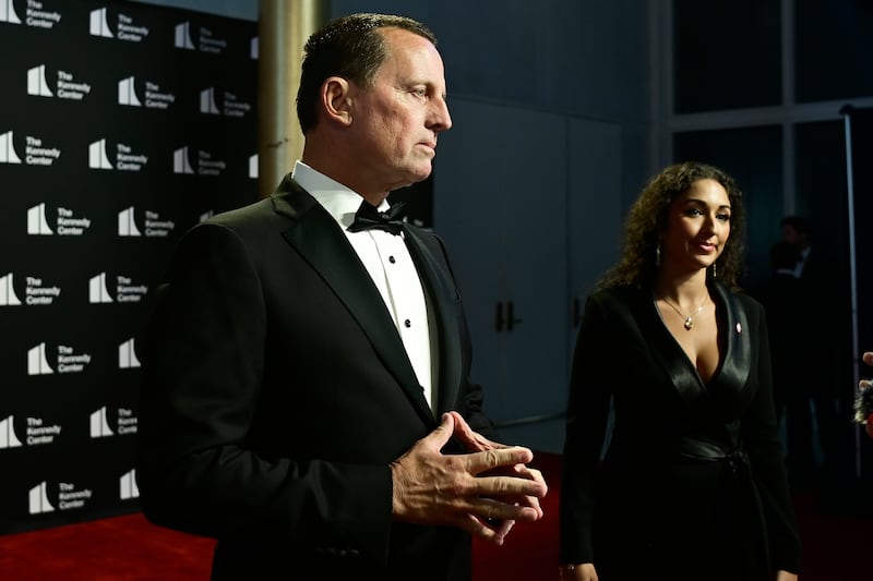 WASHINGTON, DC - JUNE 11: Roma Daravi (right), Vice President of Public Relations for the John F. Kennedy Center for the Performing Arts, stands as Ric Grenell (left), President of the John F. Kennedy Center for the Performing Arts, is interviewed in the red carpet at the opening of “Les Miserables” at the John F. Kennedy Center for the Performing Arts on June 11, 2025 in Washington, DC. (Photo by Shannon Finney/Getty Images)