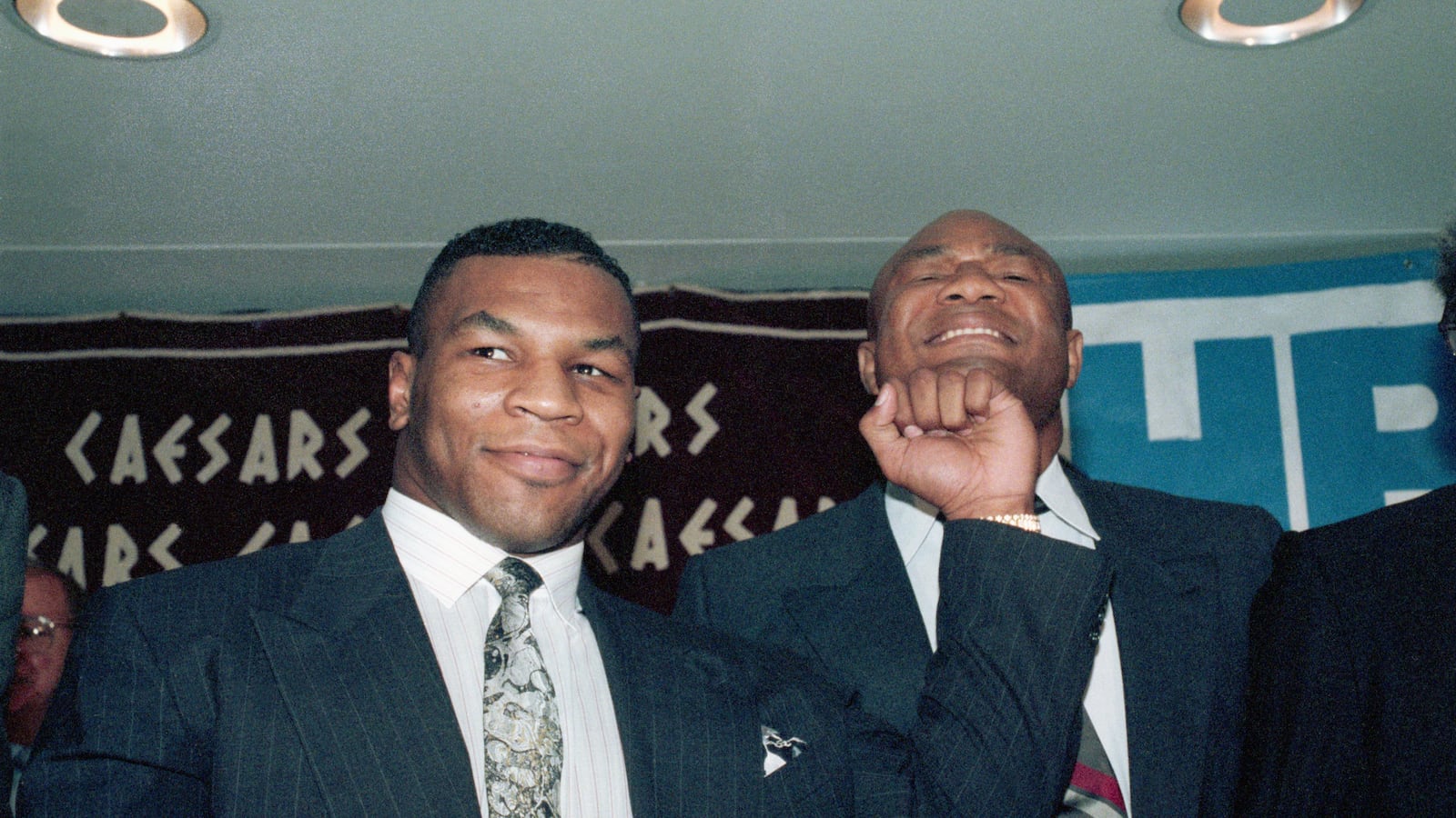 Mike Tyson and George Foreman.