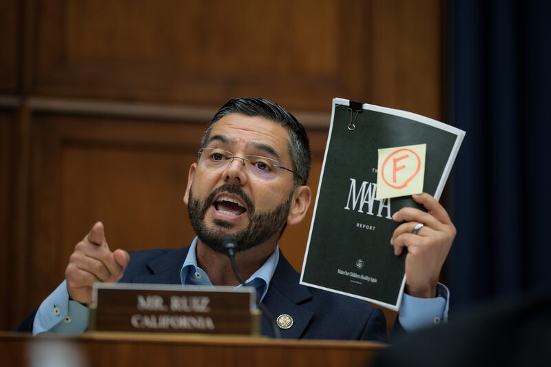 WASHINGTON, DC - JUNE 24: U.S. Rep. Raul Ruiz (D-CA) holds up the Make Our Children Healthy Again Assessment (MAHA) report while questioning Health and Human Services (HHS) Secretary Robert F. Kennedy Jr. during the House Energy and Commerce Committee Health Subcommittee in the Rayburn House Office Building on June 24, 2025 in Washington, DC. The committee met to hear testimony on the FY2026 Department of Health and Human Services budget. (Photo by Kayla Bartkowski/Getty Images)