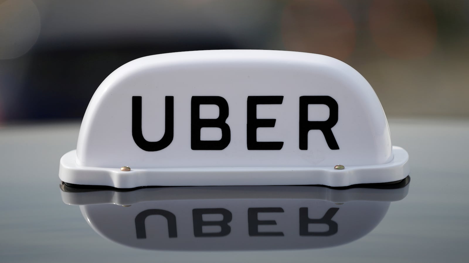 2021-02-12T130748Z_1734734660_RC21RL90K8JR_RTRMADP_3_UBER-BRITAIN_w1q9x0