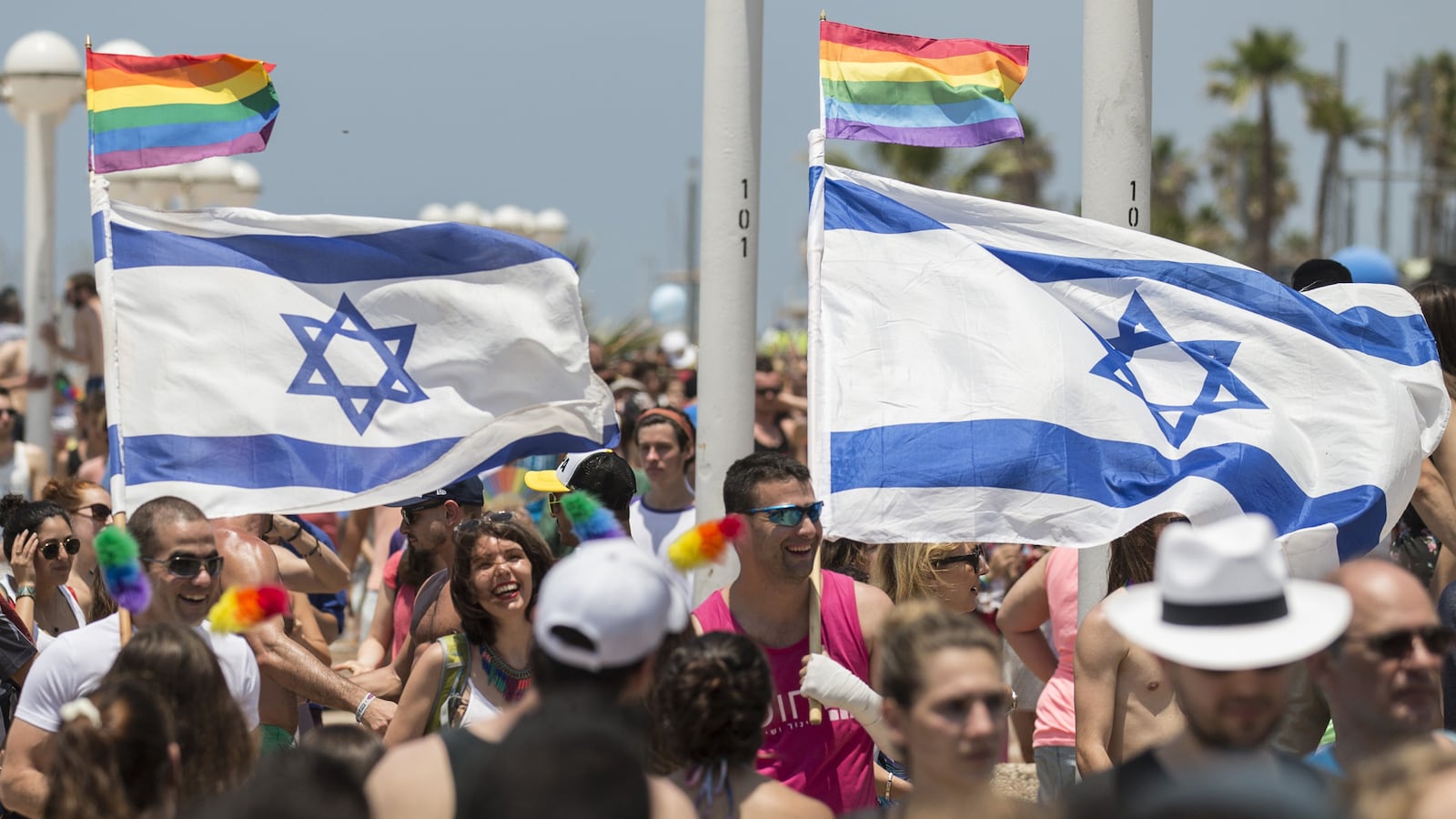 articles/2014/06/30/i-traveled-6-000-miles-and-a-lifetime-to-see-the-pride-flag-fly-at-the-u-s-embassy-in-israel/140630-israel-pride-neal-tease_kbajqz