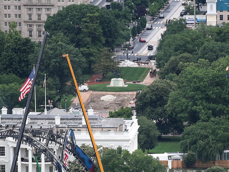 Construction continues for the upcoming UFC match alongside the ballroom addition on the South Lawn of the White House on May 26, 2026 in Washington, DC.