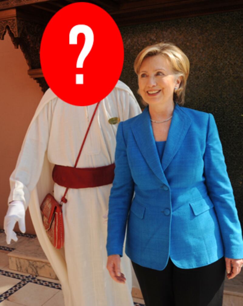 galleries/2011/03/07/gaddafi-or-hotel-doorman/gaddafi-doorman-3-question_p5sn4m