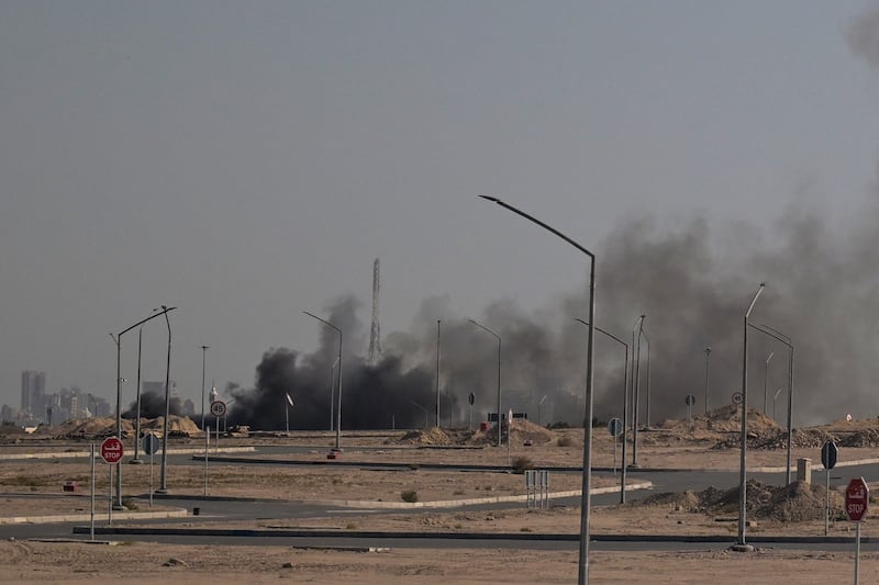 Smoke rises from a reported Iranian strike in the area where the U.S. Embassy is located in Kuwait City on March 2, 2026, a day after another Iranian strike killed six U.S. service members in Kuwait.