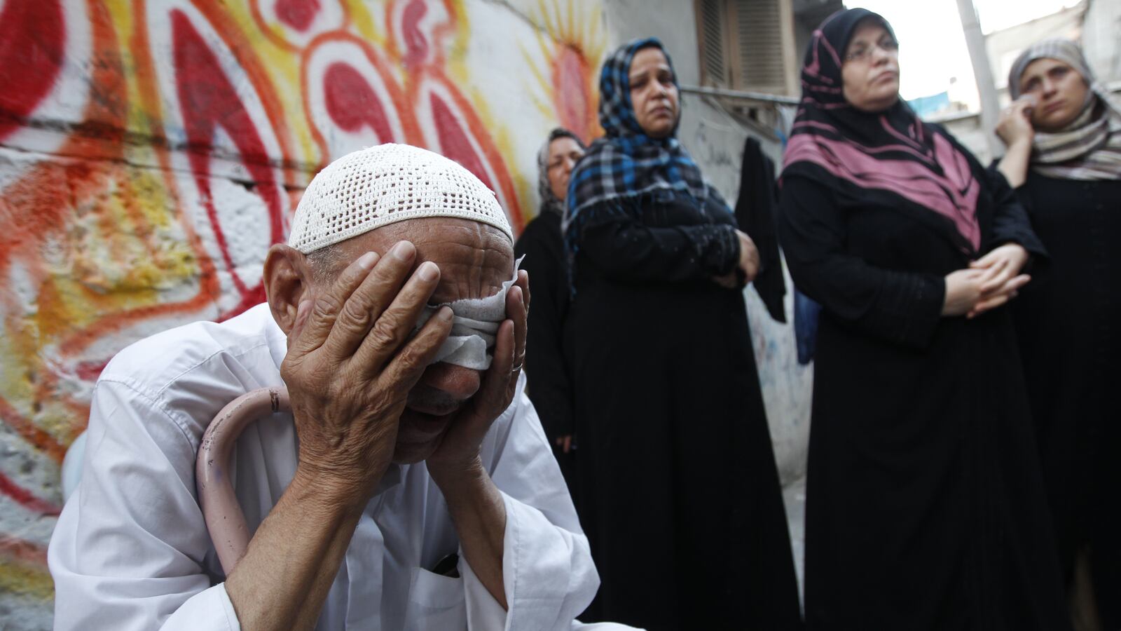 articles/2012/06/29/expendable-lives/gaza-mourning-openz_koaefo