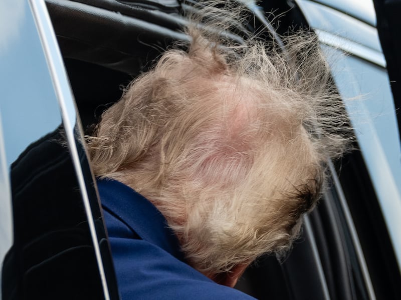 Donald Trump enters an SUV after arriving on Air Force One at Newark Liberty International Airport