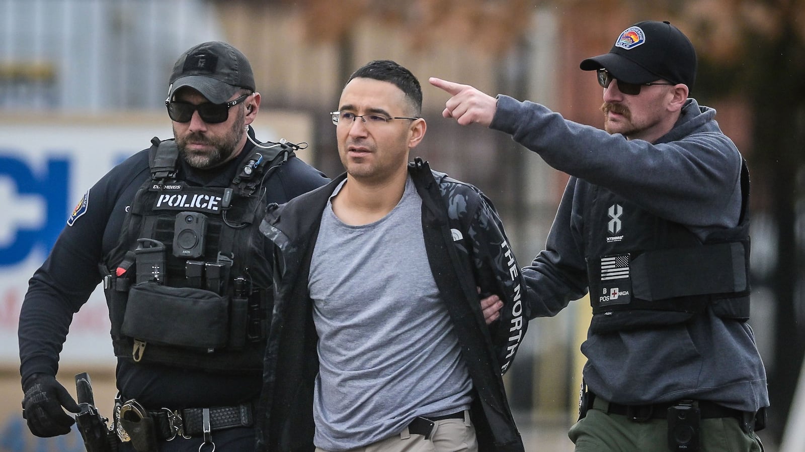 Solomon Pena Republican Candidate for New Mexico House District 14 being taken into custody by APD police officers Monday afternoon in SW Albuquerque. The former Republican candidate for New Mexico's House was arrested for allegedly a series of drive-by shootings that targeted Democratic lawmakers' homes.